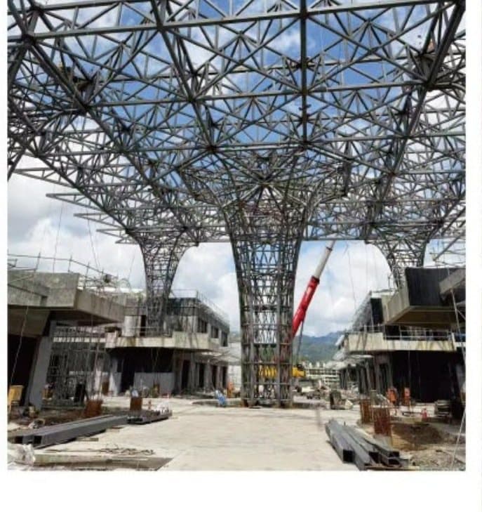 Steel lattice column and pipe truss canopy